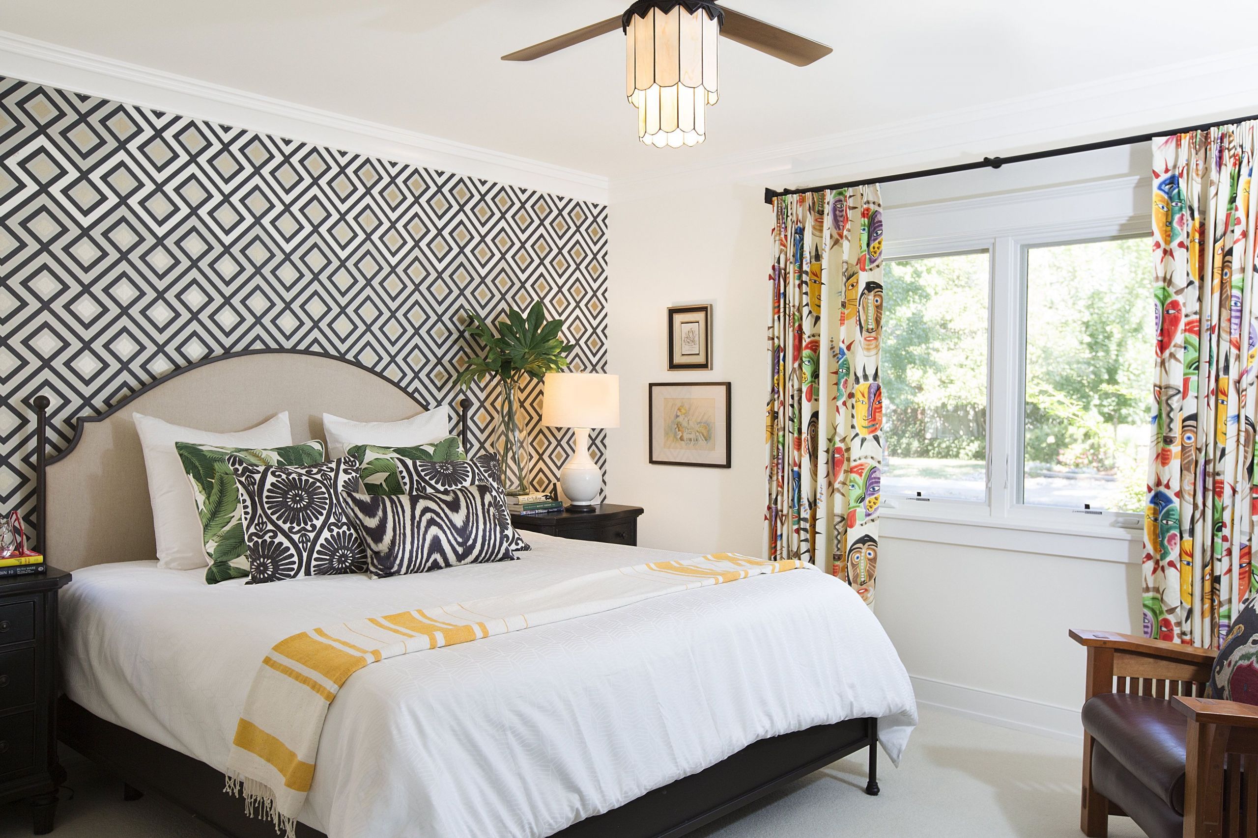 Accent Wallpaper Bedroom
 Accent wall with geometric wallpaper and colorful drapery