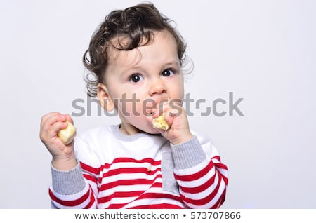 Baby Eating Hair
 Child Trying Feed Himself Baby Food Stock