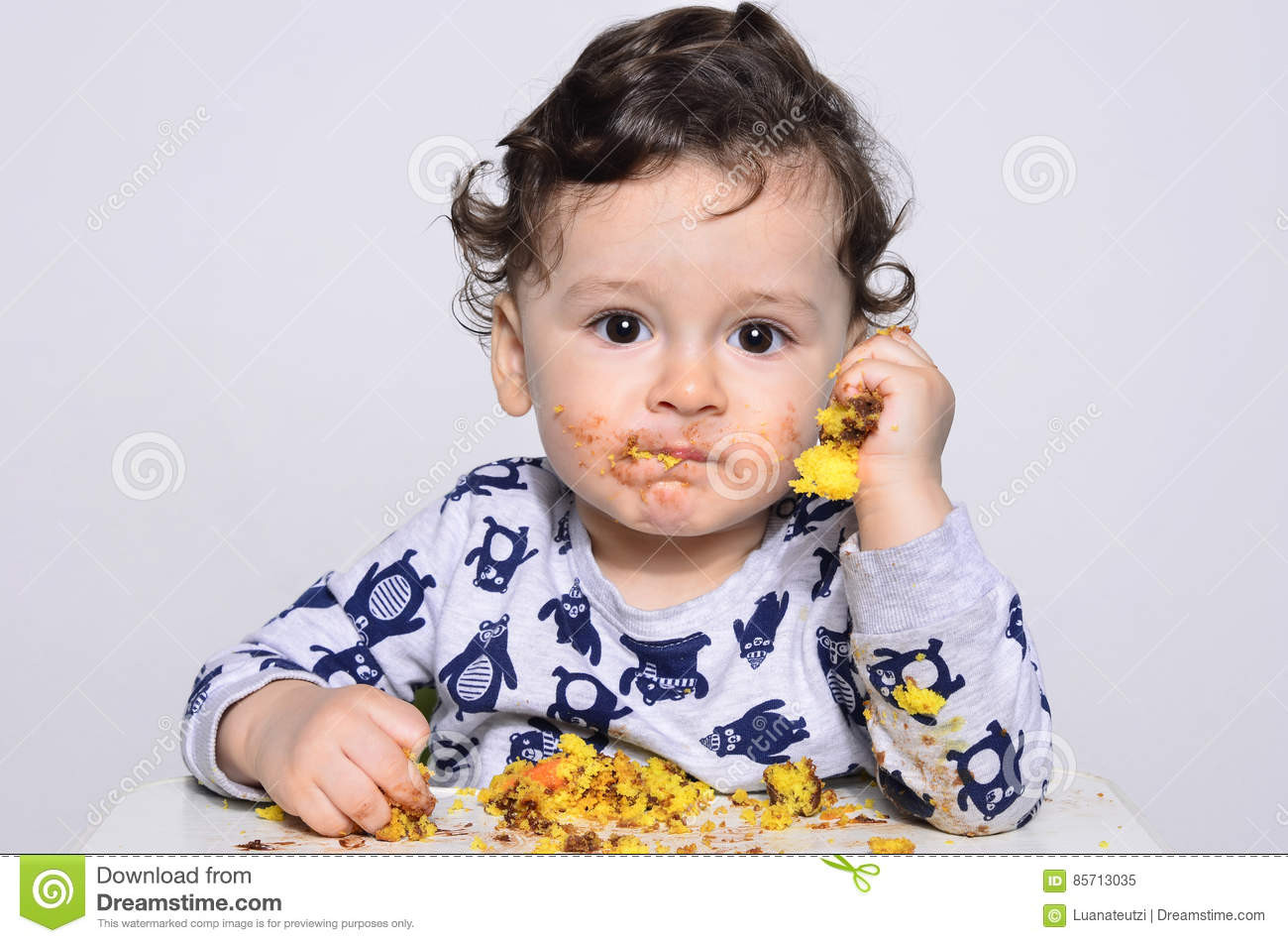 Baby Eating Hair
 e Year Old Kid Eating A Slice Birthday Smash Cake By