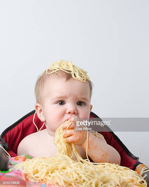 Baby Eating Hair
 Angel Hair Pasta Stock s and