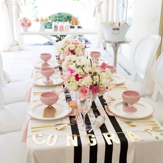 Backyard Graduation Party Ideas Pink And Black Gold Table Set Up
 A Pretty in Pink Graduation Party plete With Sweet