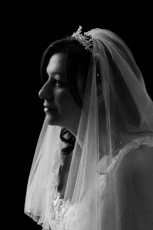Black And White Wedding Veil
 Black and white wedding photo of a bride in her veil