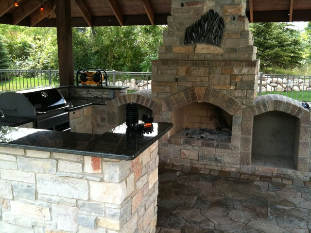 Brick Outdoor Kitchen
 outdoor Kitchen with fireplace Traditional Patio