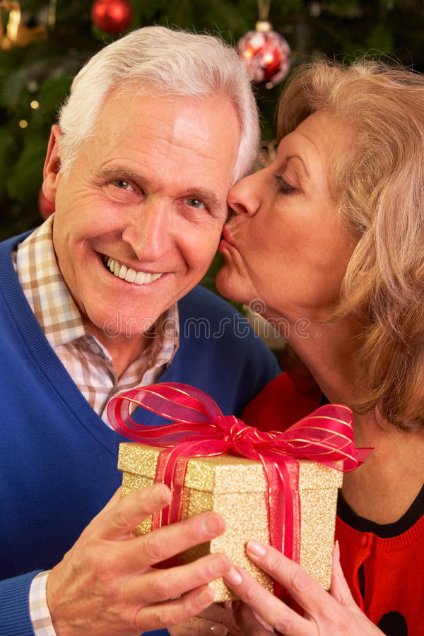 Christmas Gift Ideas For Older Couple
 Senior Couple Exchanging Christmas Gifts Stock Image