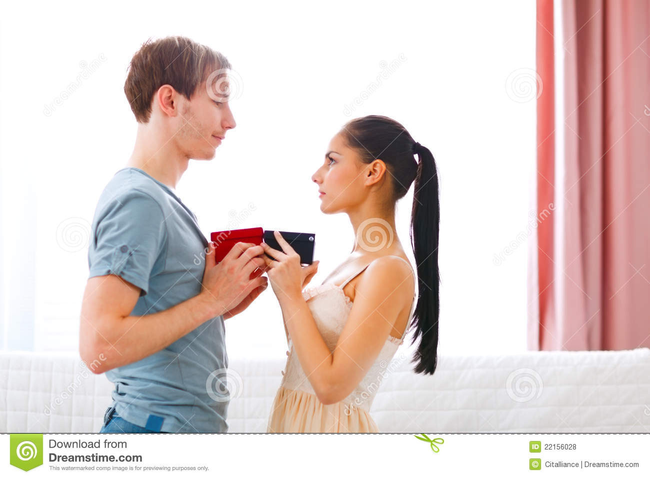 Christmas Gift Ideas For Young Married Couples
 Romantic Young Couple Exchanging Gifts Royalty Free Stock