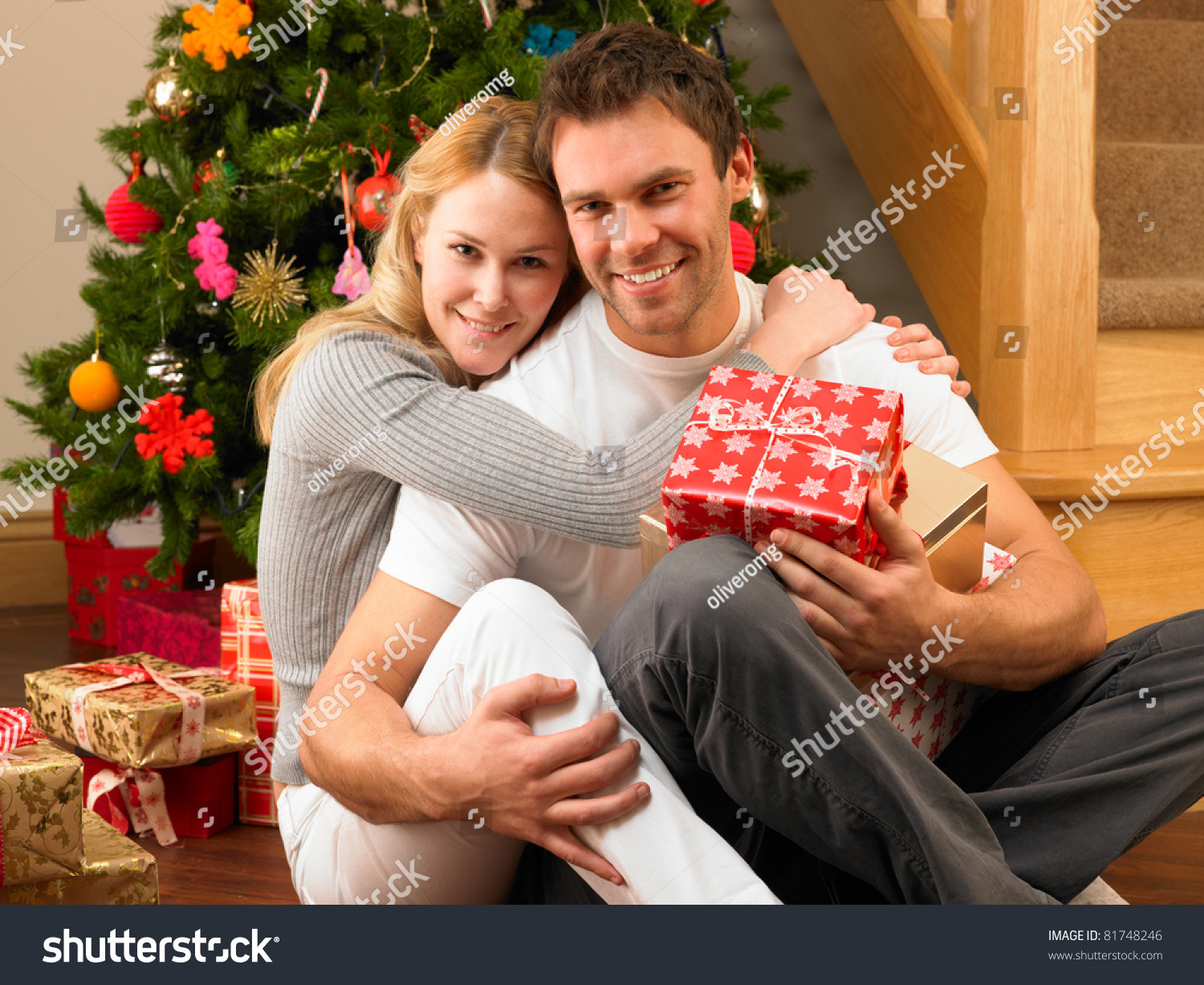 Christmas Gift Ideas Young Couple
 Young Couple With Gifts In Front Christmas Tree Stock