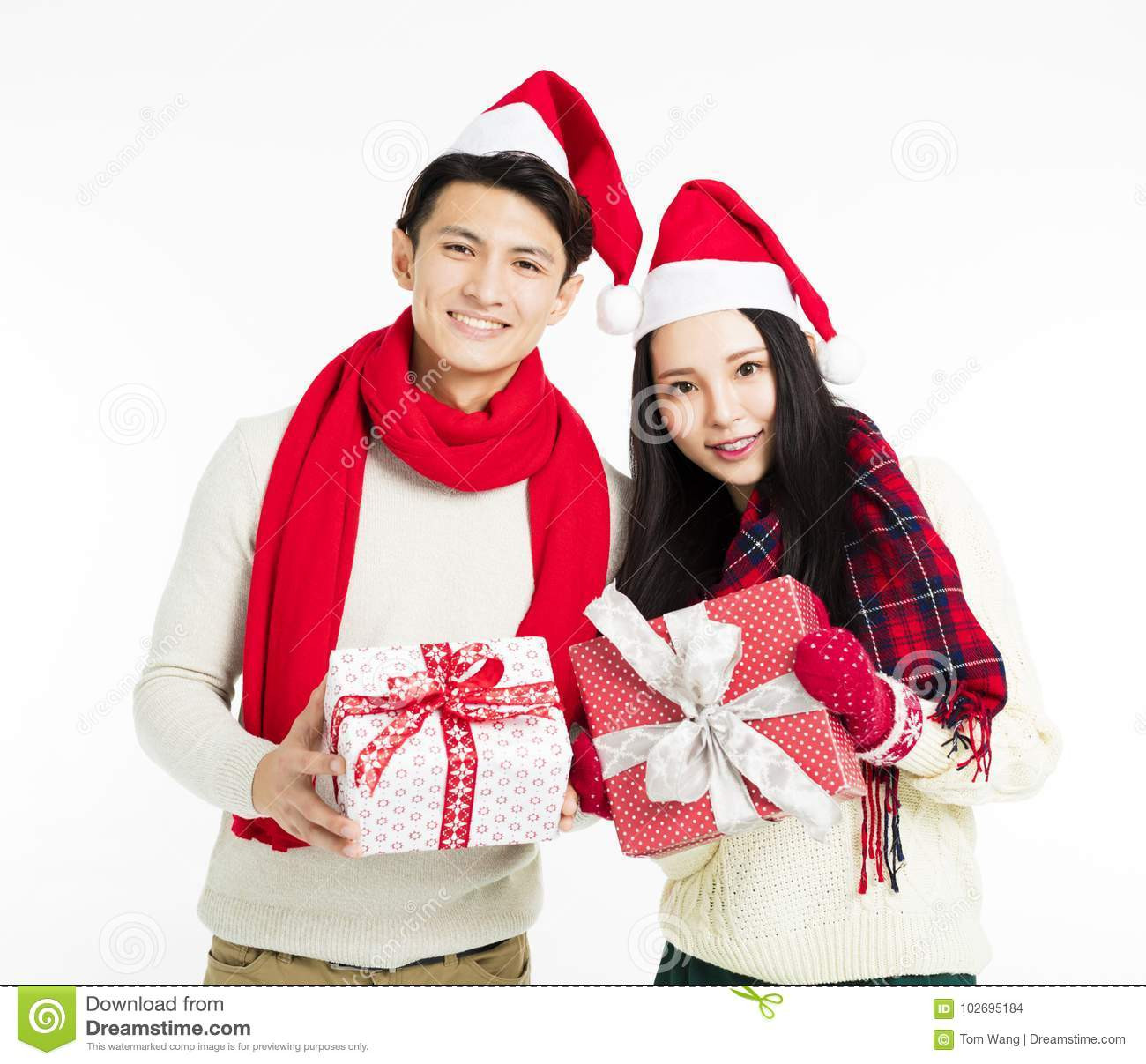 Christmas Gift Ideas Young Couple
 Young Couple Showing Christmas Gifts Stock Image