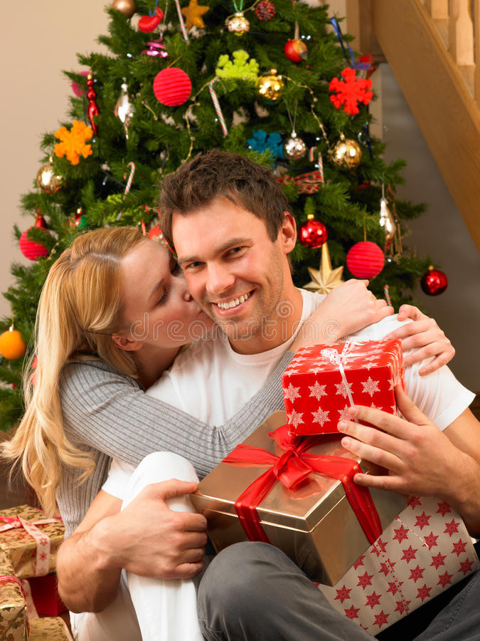 Christmas Gift Ideas Young Couple
 Young Couple With Gifts In Front Christmas Tree Stock