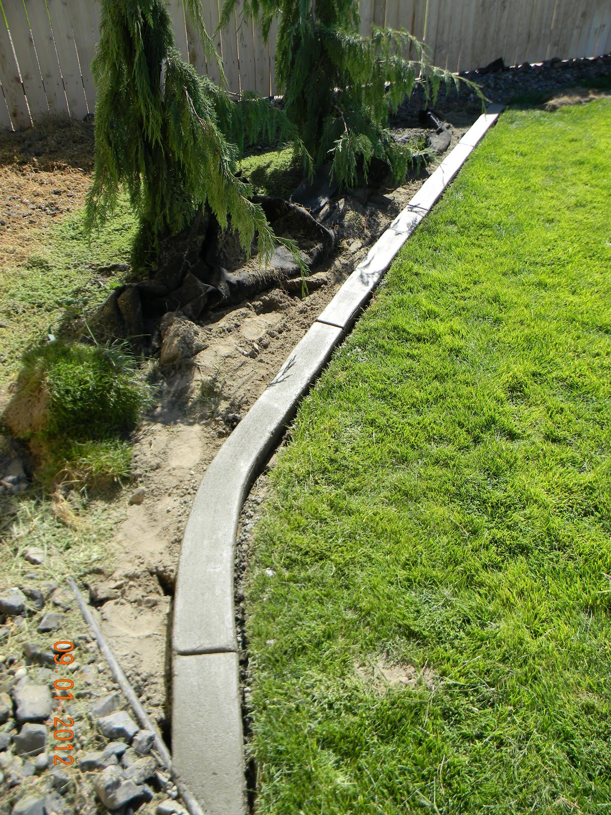 Concrete Landscape Edging
 Home Is Where They Love You DIY Landscaping Curb