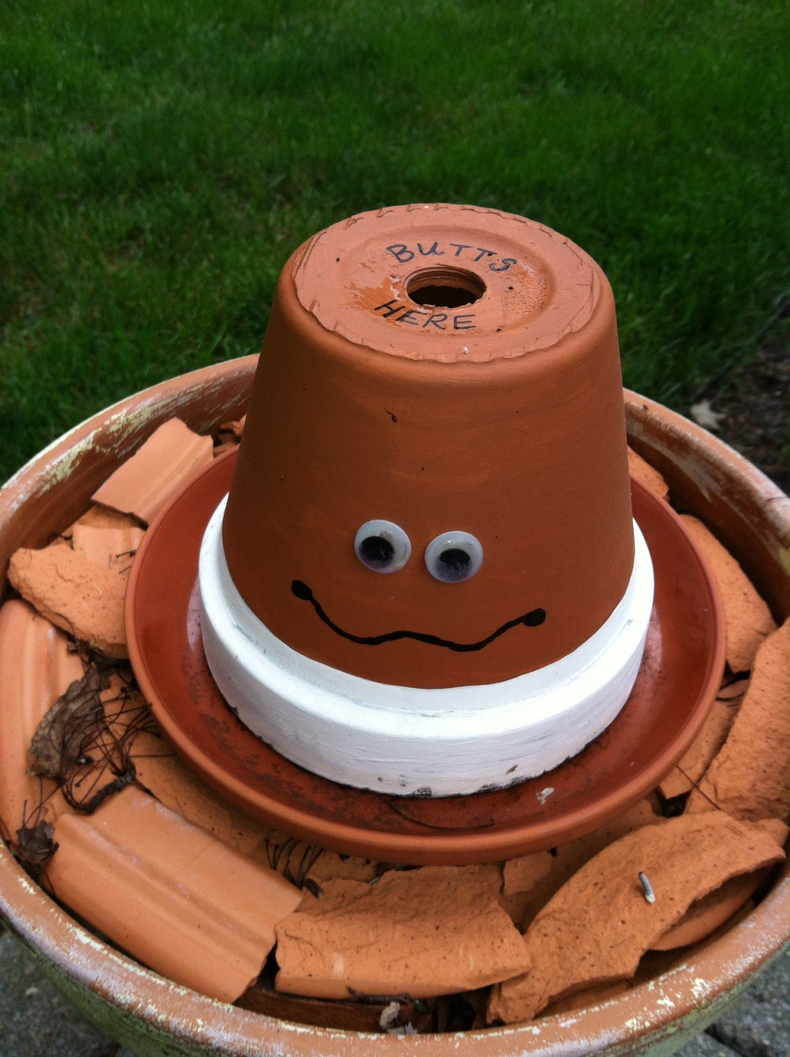 DIY Outdoor Ashtray
 Butt Head outdoor ashtray from clay pots Painted
