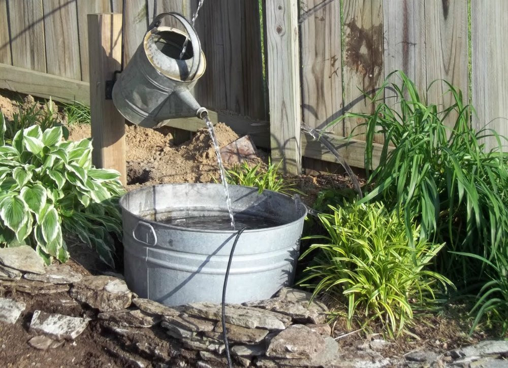 DIY Outdoor Drinking Fountain
 Vintage Watering Can DIY Fountain Ideas 10 Creative