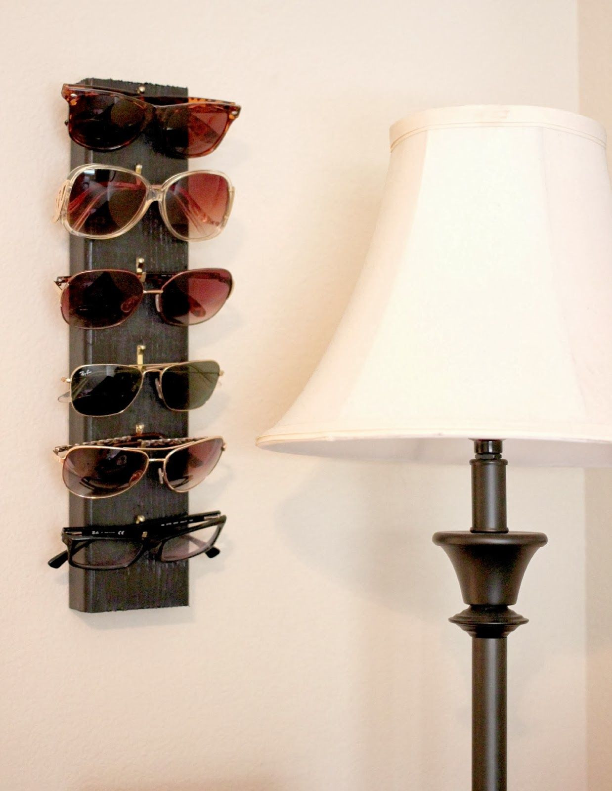 DIY Sunglass Organizer
 An easy diy project to hang all your sunglasses you just