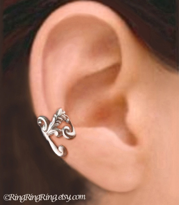 Earring In Right Ear
 Empire silver ear cuff earring Right side non pierced