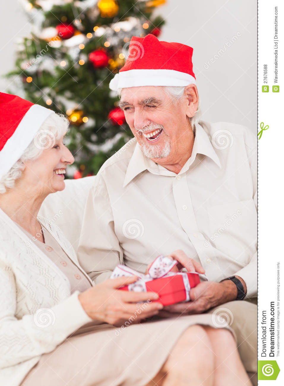 Gift Ideas For Elderly Couple
 Elderly Couple Exchanging Christmas Gifts Royalty Free