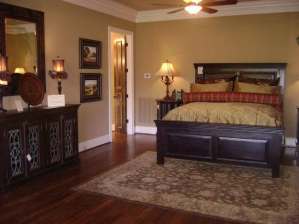 Gold Bedroom Walls
 Dark furniture gold and red bedding with gold walls and