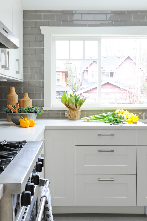 Grey Backsplash Kitchen
 White Kitchen with Grey Backsplash Transitional Kitchen