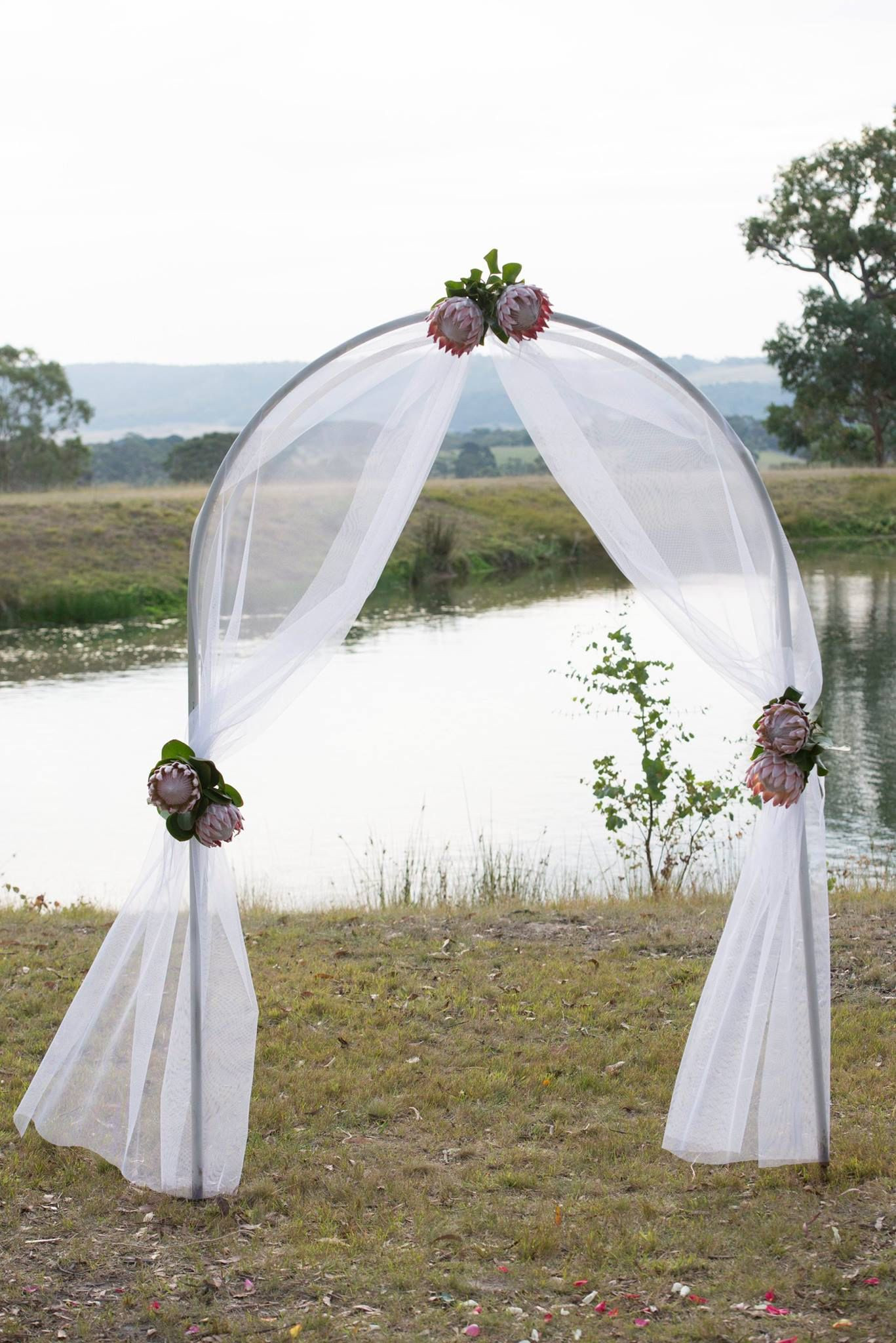 How To Decorate A Wedding Arch
 Gorgeous ceremony Arch decorated with tulle and King