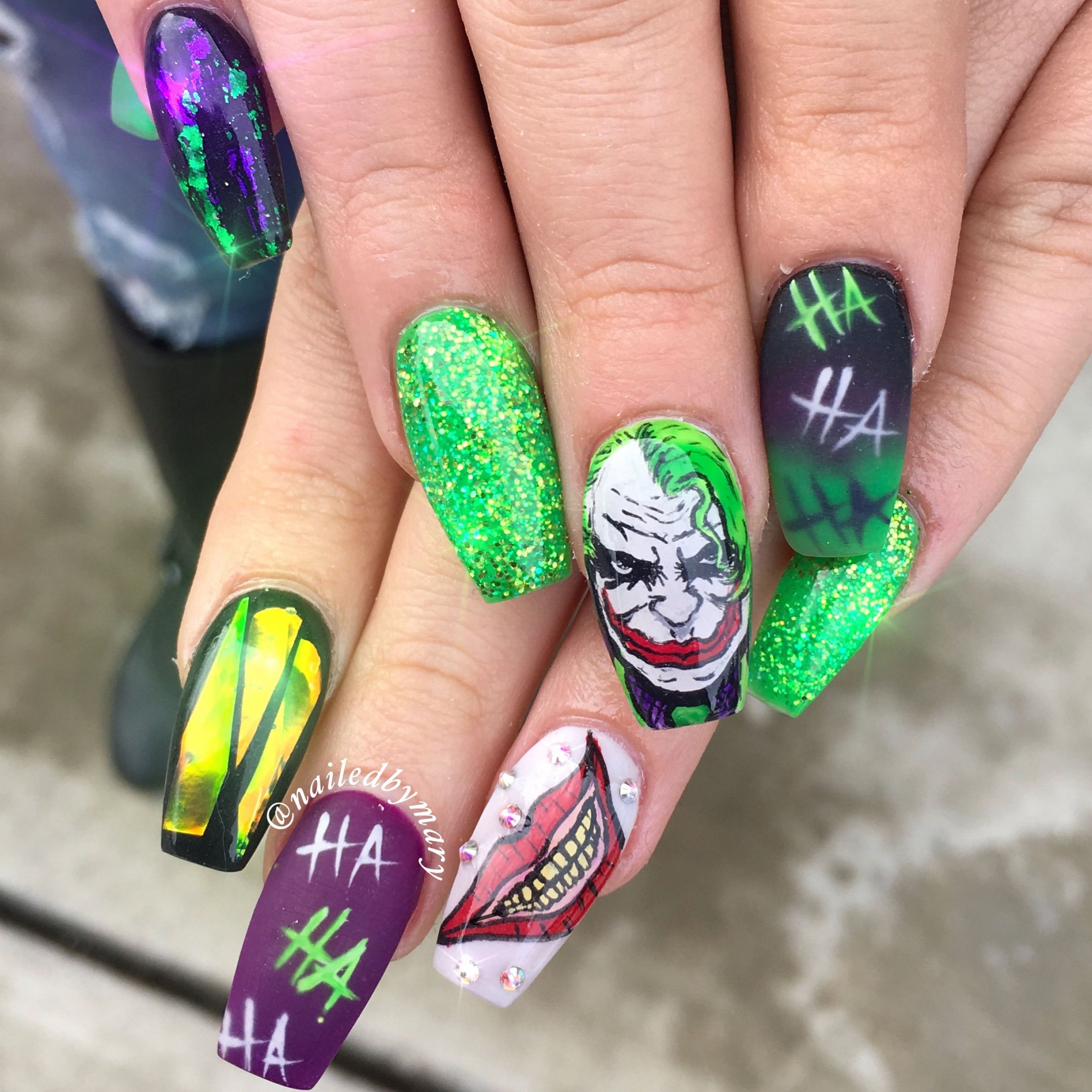 Joker Nail Art
 The Joker marvels D C ics nails green acrylic hand