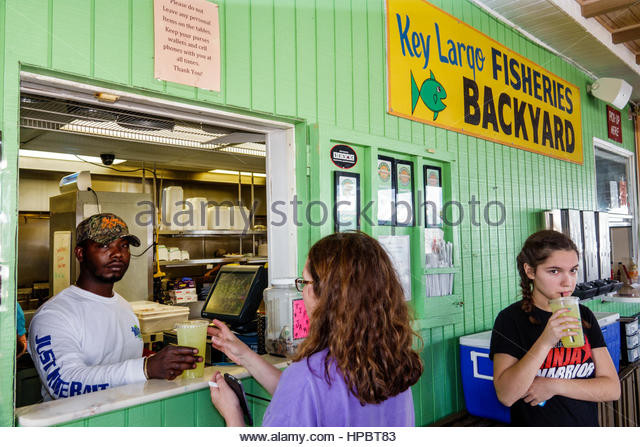 Key Largo Fisheries Backyard
 Teenagers Eating Restaurant Stock s & Teenagers