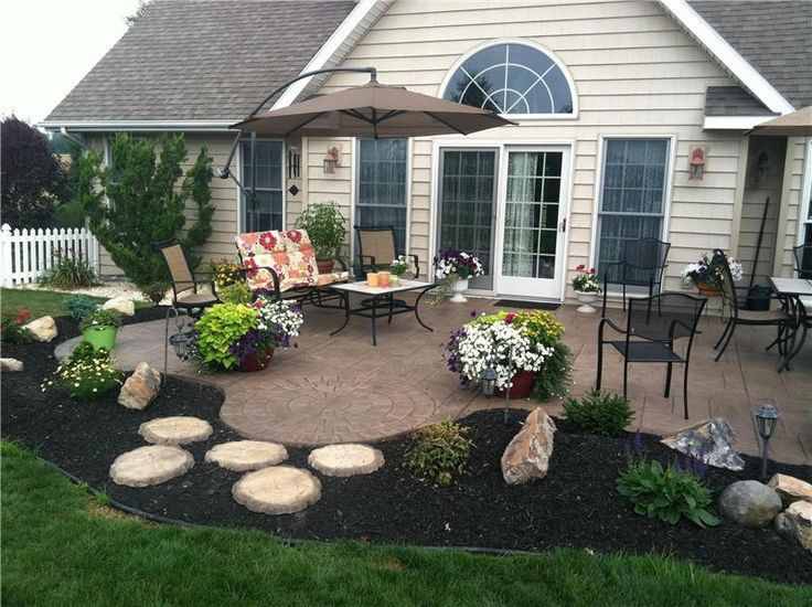 Landscape Around Concrete Patio
 stamped concrete patio love the shape and landscaping