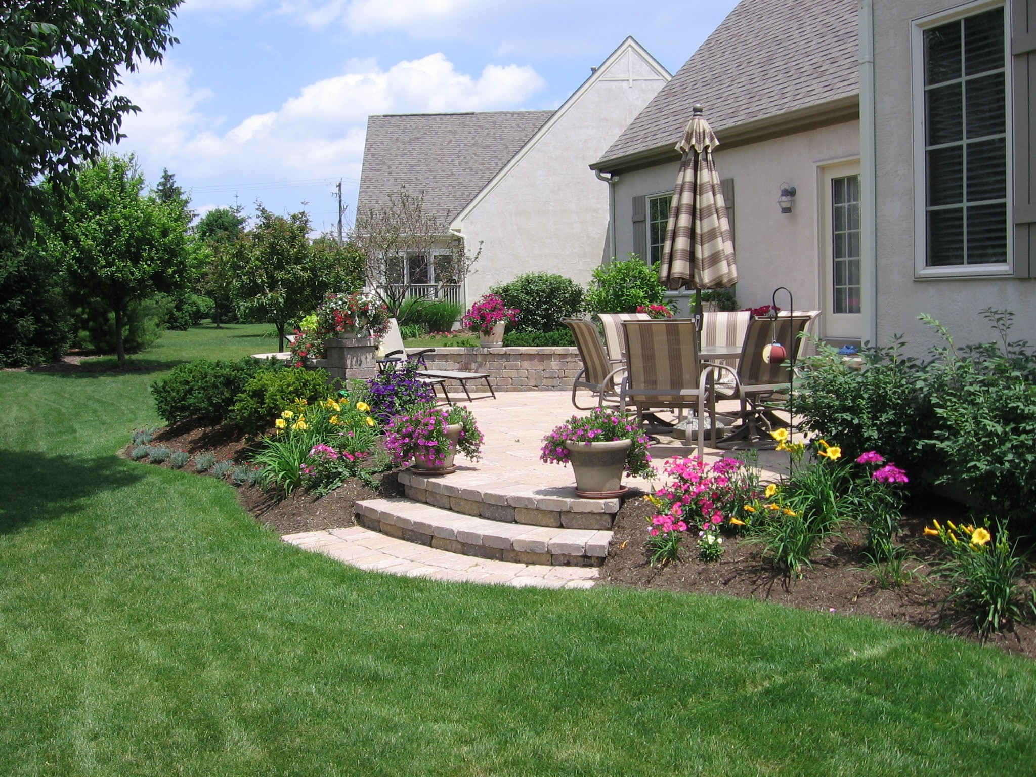 Landscaping Around Patio
 Pave Your Way to Better Living Buck and Sons Landscape