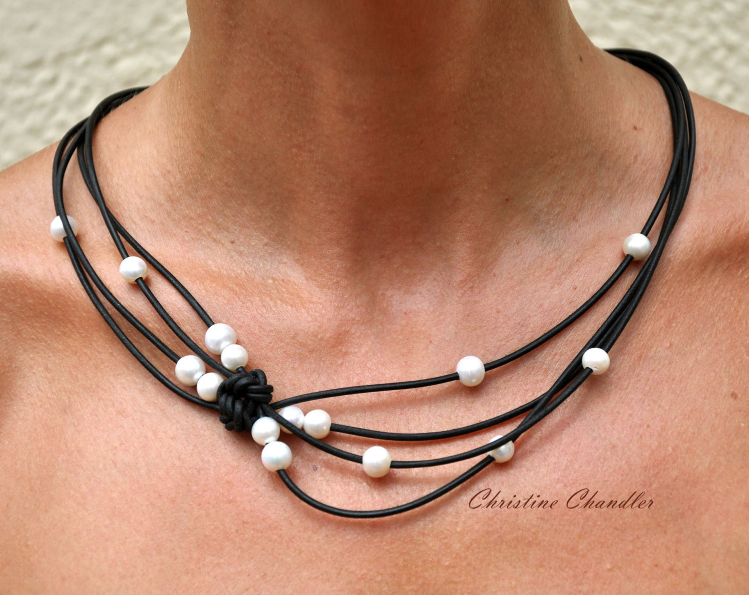 Leather Necklace With Pearl
 Pearl and Leather Jewelry Black & White Reef Knot Necklace