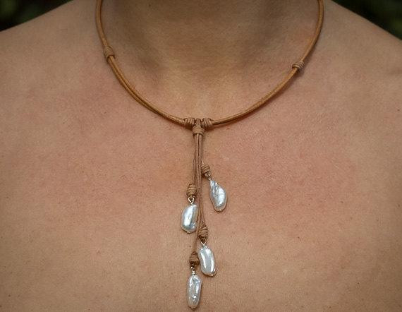 Leather Necklace With Pearl
 Freshwater pearl and leather necklace by LeatherPearlJewelry