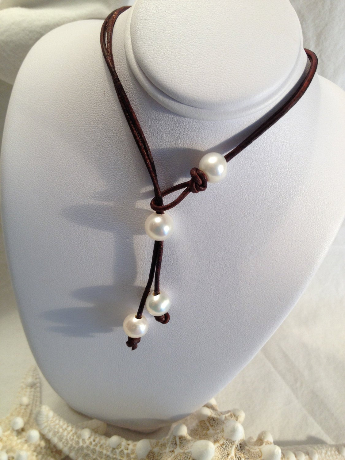 Leather Necklace With Pearl
 Pearl and Leather Lariat Necklace Creamy White Pearls