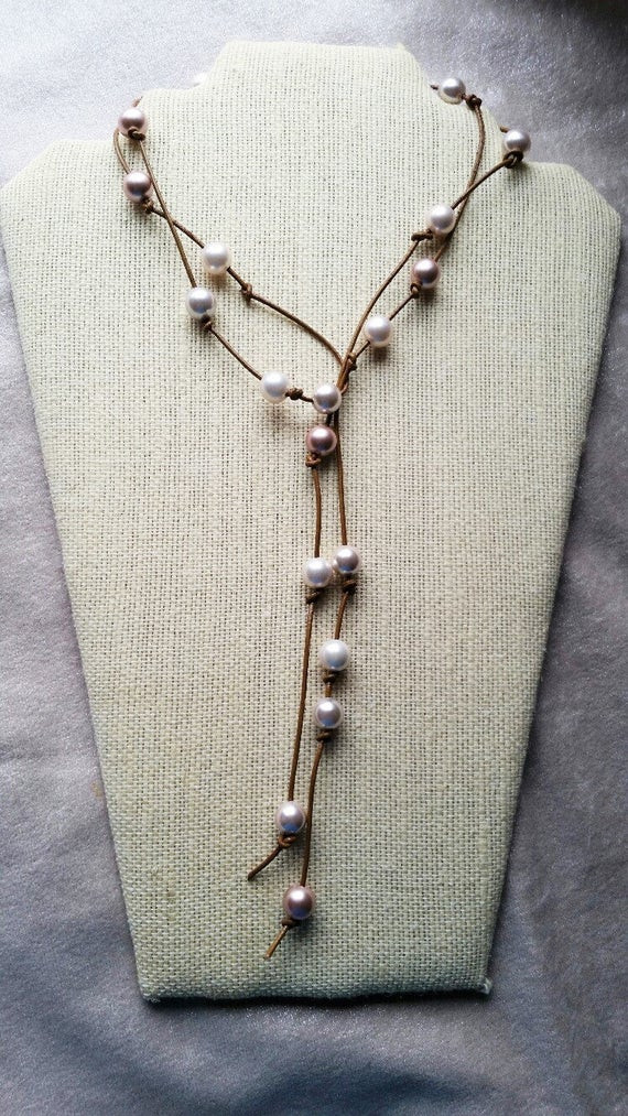Leather Necklace With Pearl
 Pearl and leather necklace leather Pearl necklace