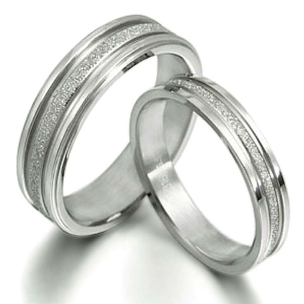 Matching Wedding Rings For Him And Her
 His and Her Matching Wedding Bands Titanium Ring Set 016A3