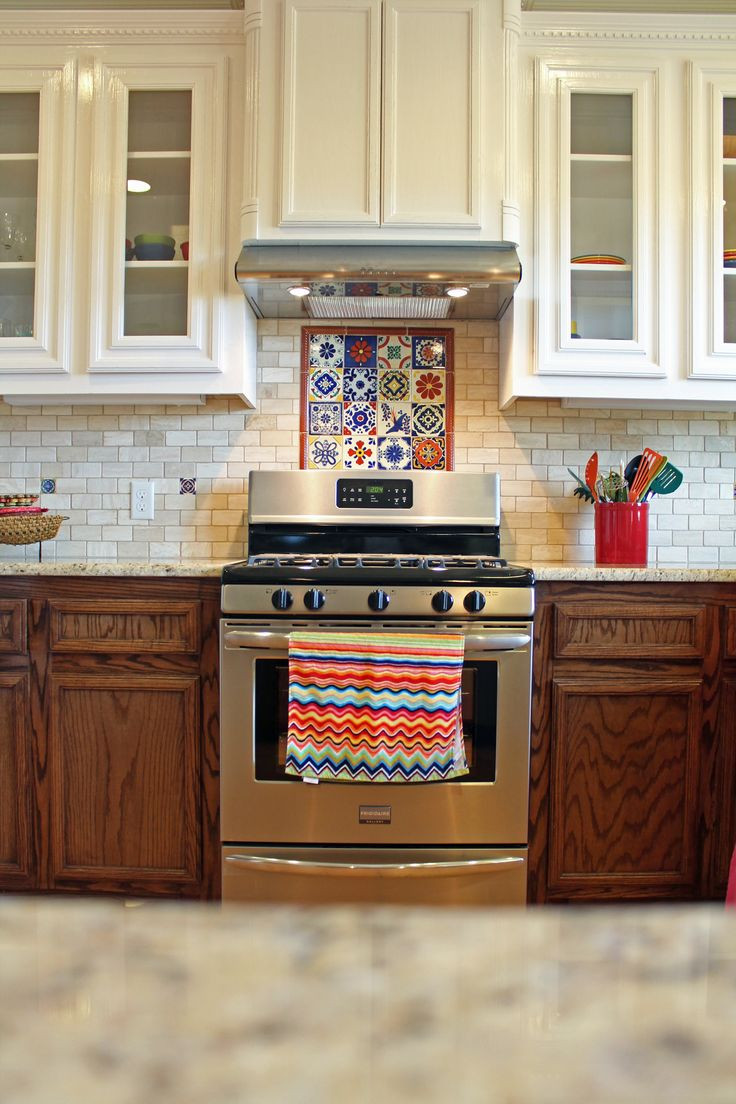 Mexican Tile Backsplash Kitchen
 Spanish kitchen design with talavera tile and travertine