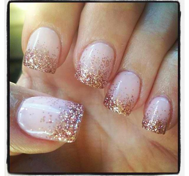 Nude Nails With Gold Glitter
 Glitter nails With a Nude base coat and gold glitter