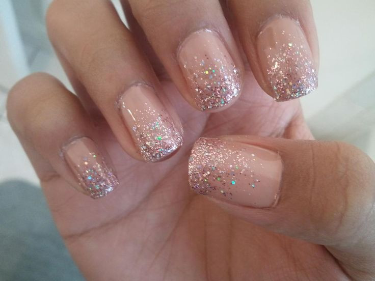 Nude Nails With Gold Glitter
 Nude Glitter Nails Looks like I light pinky peach