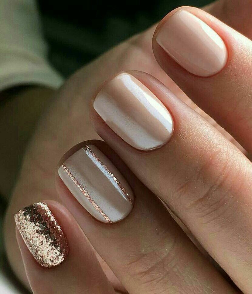 Nude Nails With Gold Glitter
 Cute neutral and rose gold nails
