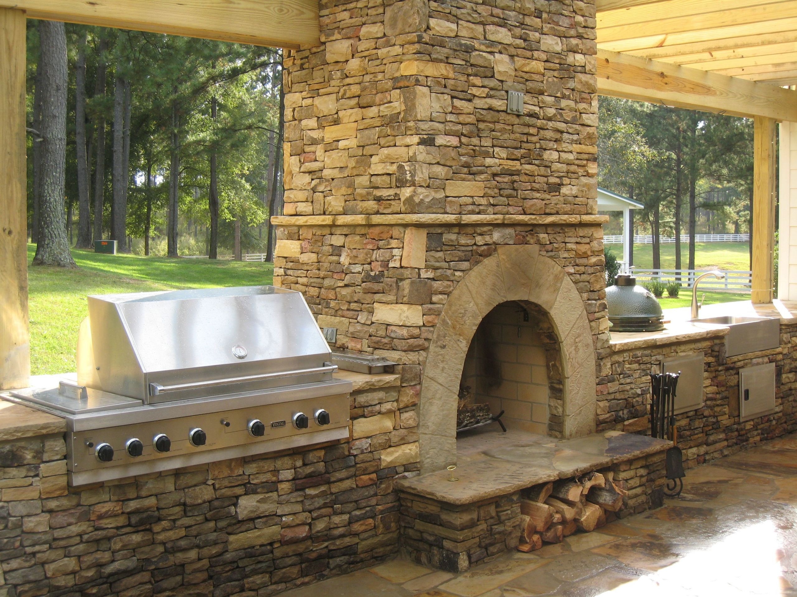 Nyc Fireplaces &amp; Outdoor Kitchens
 For upper patio Grill on one side and counter with water