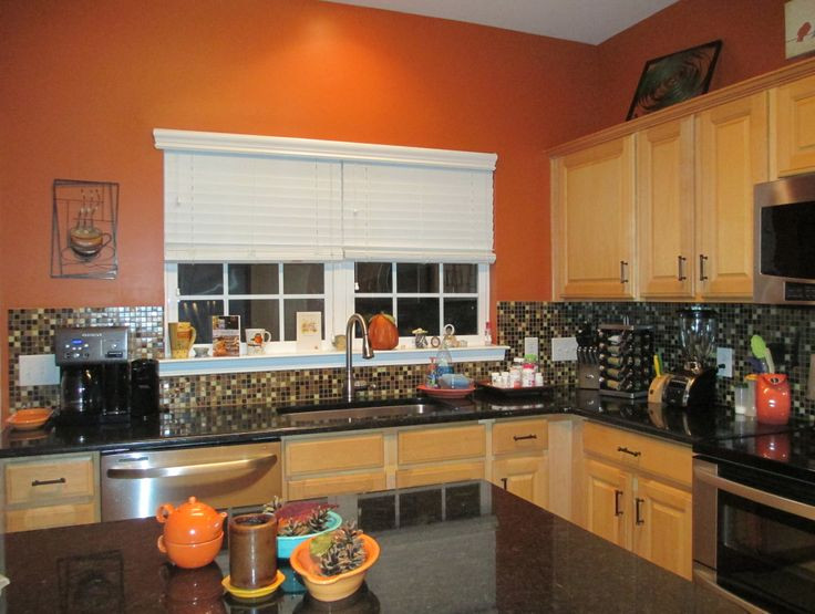 Orange Backsplash Kitchen
 burnt orange kitchen black granite countertops glass