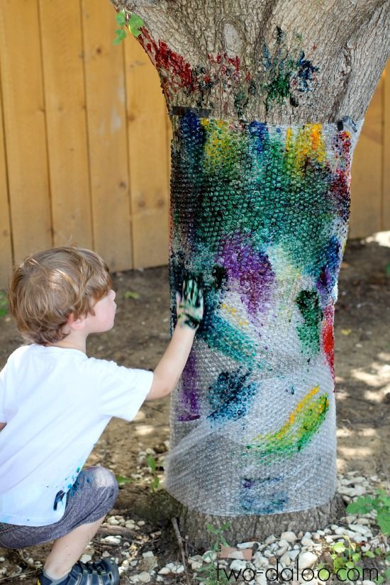 Outdoor Art Projects
 Rainbow finger painted bubble wrap tree a fun process