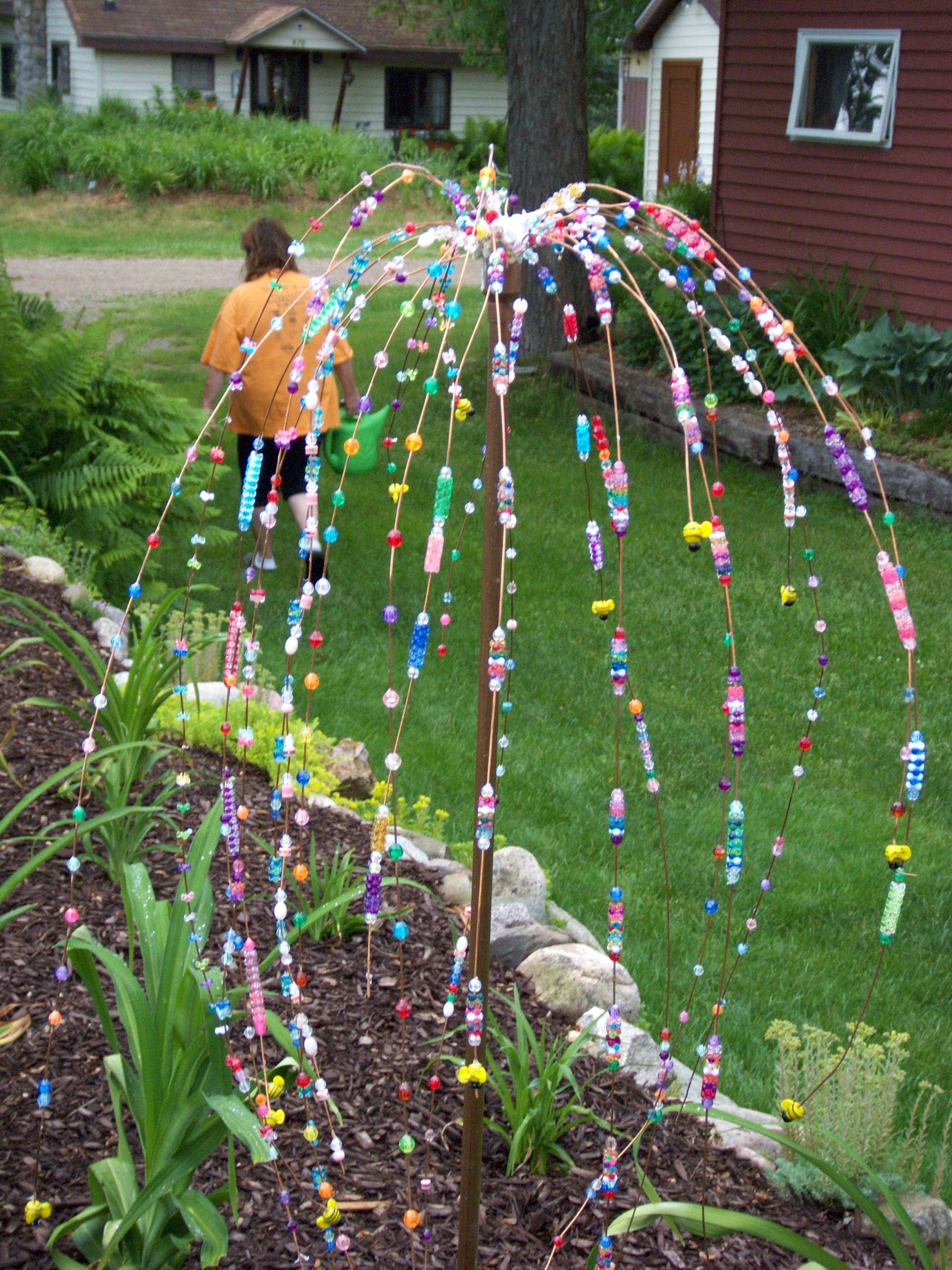 Outdoor Art Projects
 Pin by Mel Saltzman on glass beads garden art