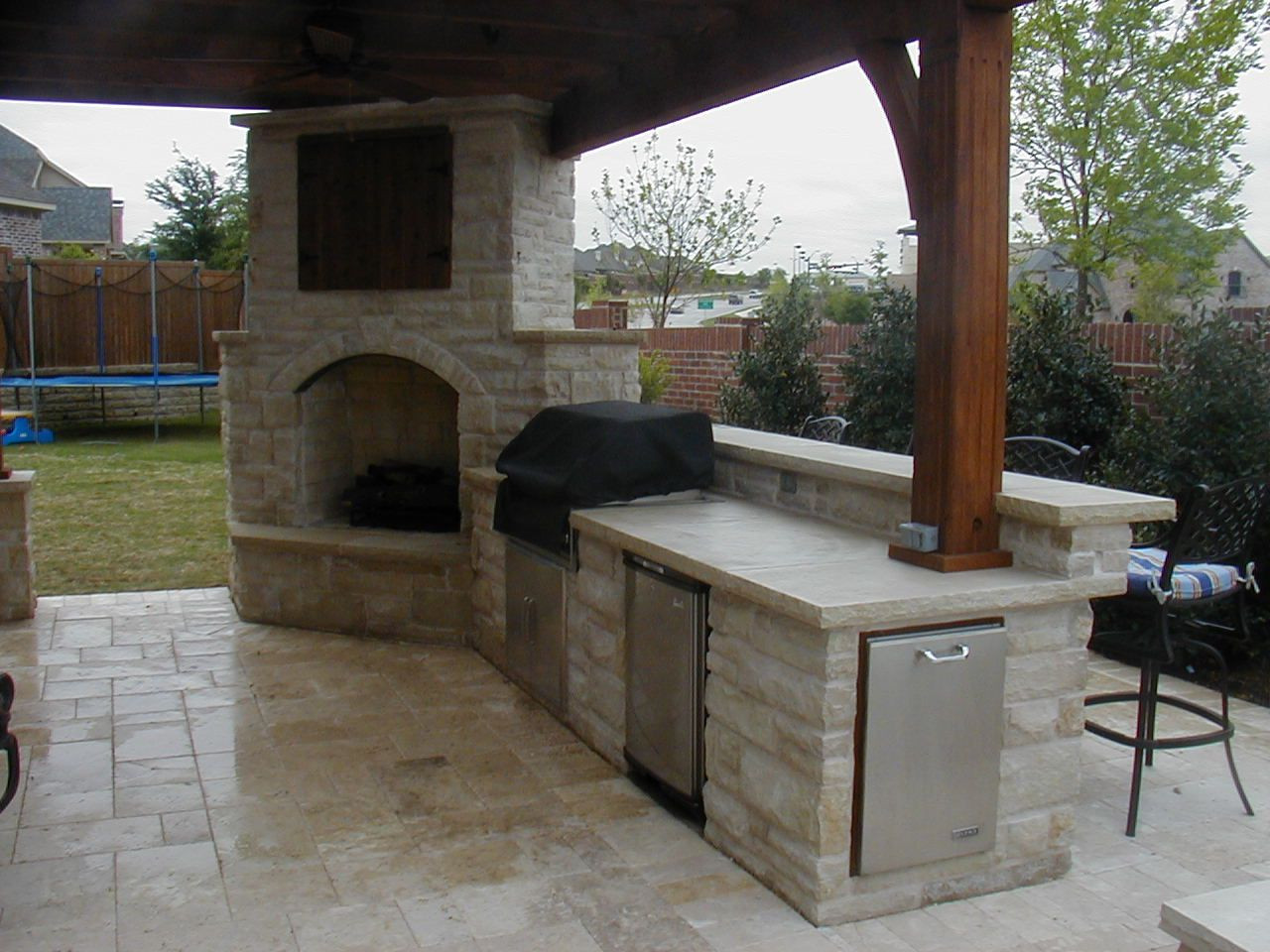 Outdoor Kitchen With Fireplace
 fireplace under deck