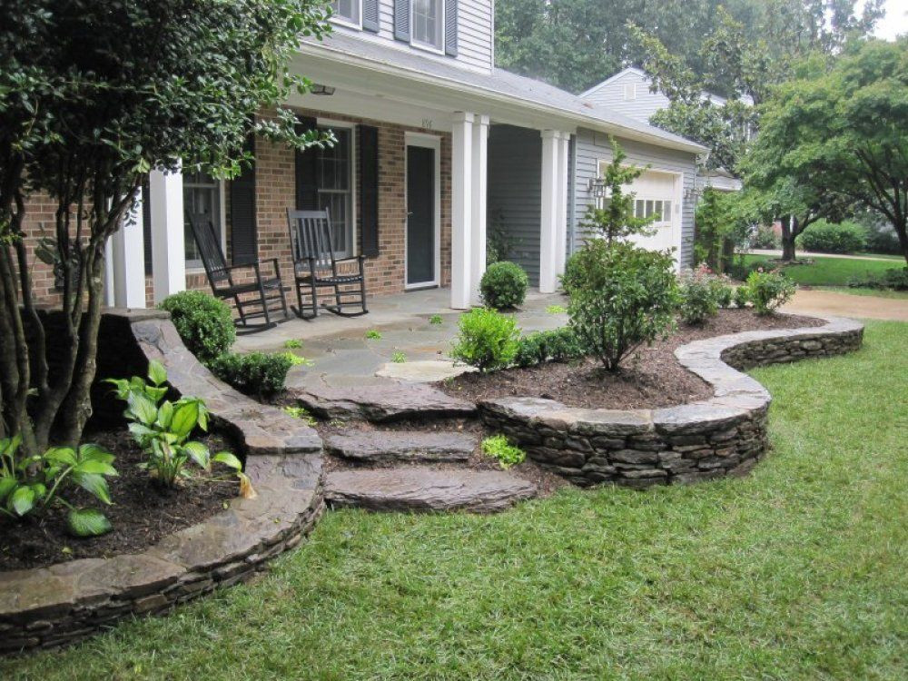 Outdoor Landscape Around House
 This landscaping design extends past the front porch and