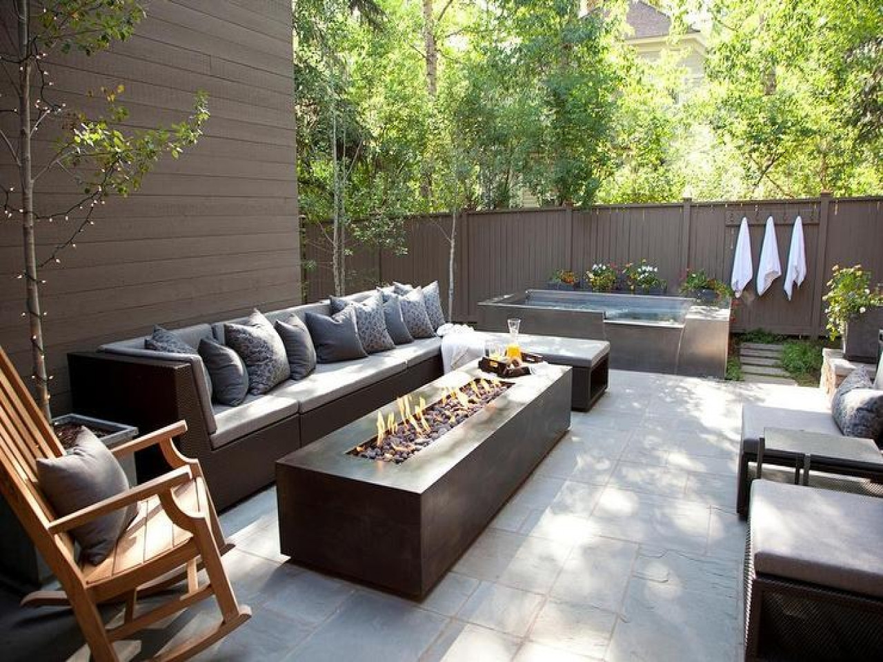 Outdoor Sectional With Firepit
 Modern Outdoor Sofa With Chaise Lounge Facing A Long Fire