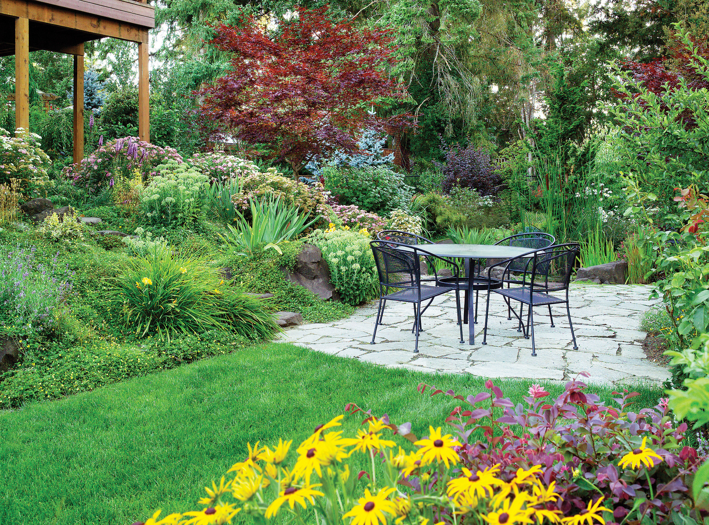 Patio Landscape Ideas
 Terraces and plants make the most of a downhill garden