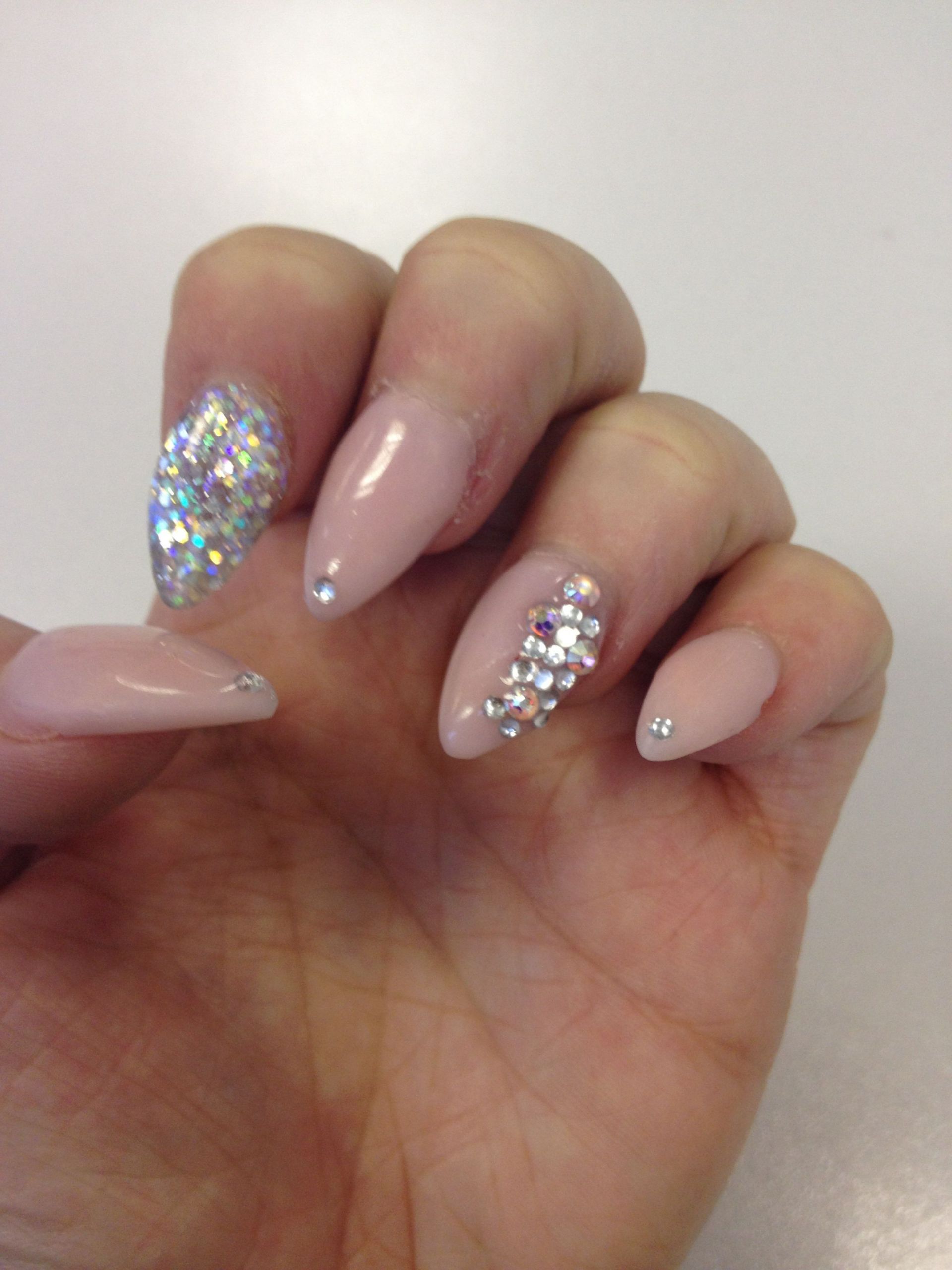 Pretty Almond Nails
 Pretty pink almond nails with sparkles