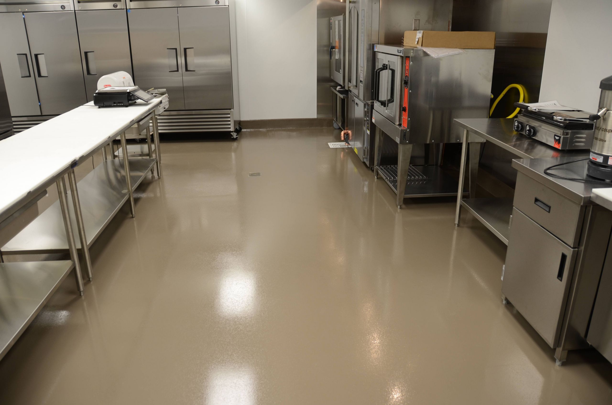 Restaurant Kitchen Floor
 Urethane cement and concrete stain in grocery store