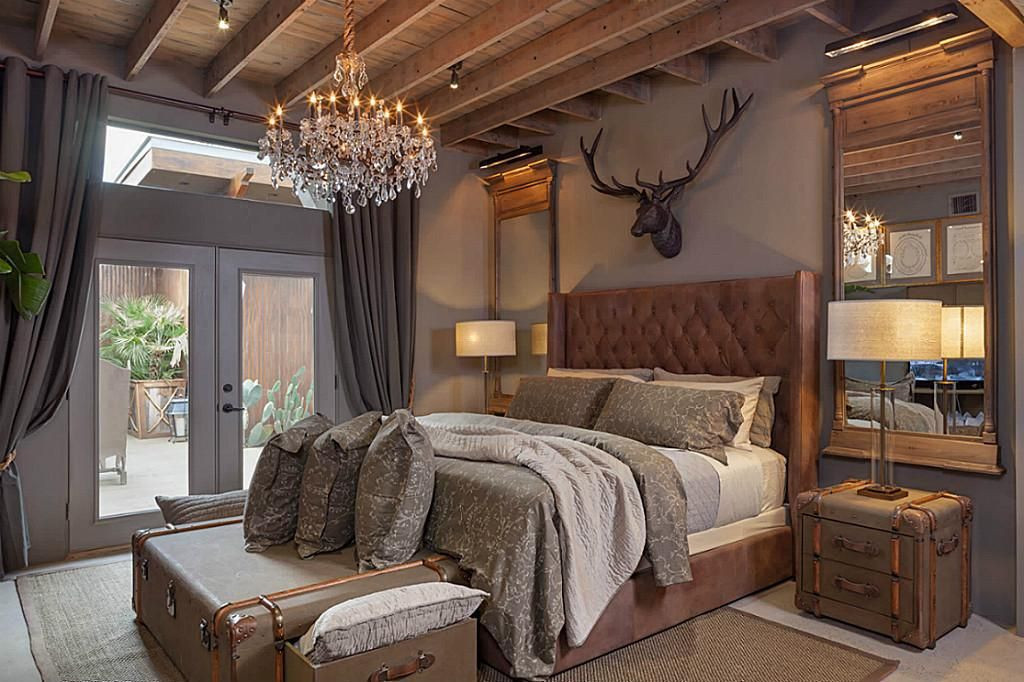 Rustic Themed Bedroom
 The Master Bedroom has expansive open rafter ceilings