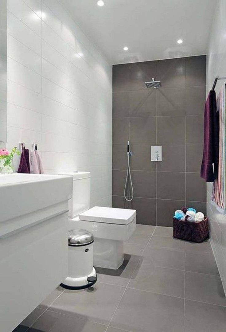 Small Bathroom Tile Design
 Natural small bathroom design with large tiles
