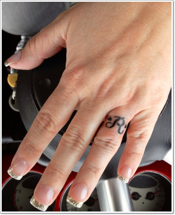 Tattooed Wedding Rings
 40 The Best Wedding Ring Tattoo Designs