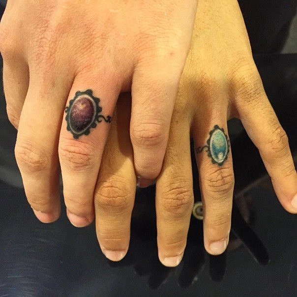 Tattooed Wedding Rings
 50 Cool Wedding Ring Tattoos To Express Their Undying Love