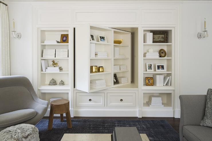 Wall Cabinets For Living Room
 Pivoting Bookcase and TV Cabinet Transitional Living