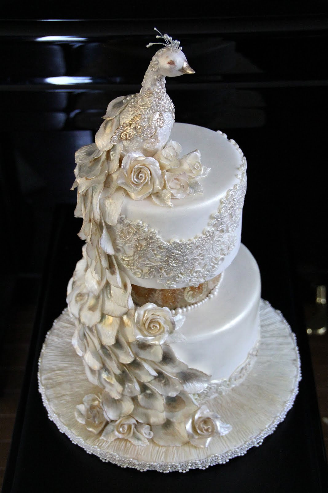 Wedding Cake Decor
 Decorate The Cake Pearl Peacock Wedding Cake featuring